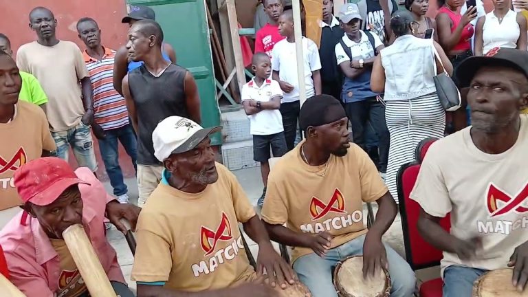 Konbit of scraping maniocs in Haiti