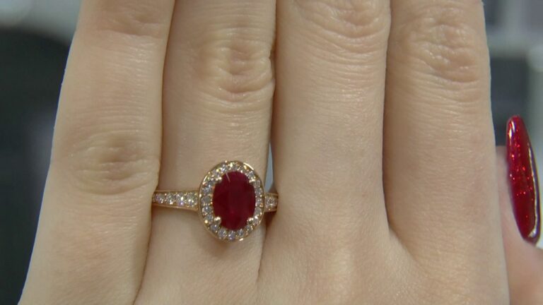 1.78 Carat Oval Cut Ruby and Diamond Halo Engagement Ring GR013