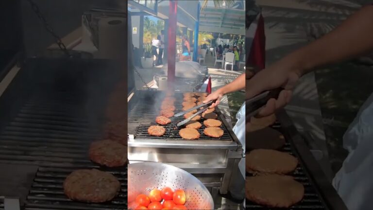 Riu Ocho Rios Chef Cooking Burgers, Jamaican Style #injamaica #travel #tourism #fun #entertainment