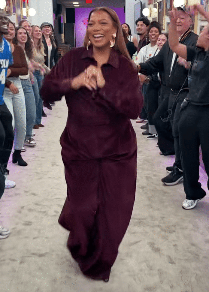 Queen-Latifah-Wears-a-Burgundy-Velvet-Jumpsuit-by-Max-Mara-on-The-Jennifer-Hudson-Show.png