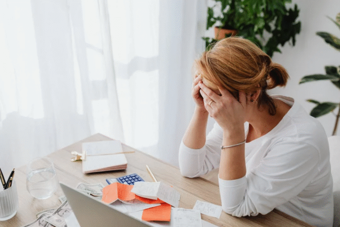 woman-desperate-with-debts.png